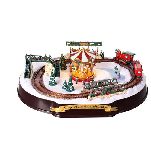 Christmas village set: train on snowy landscape, music motion and lights, 6x20x16 in 3