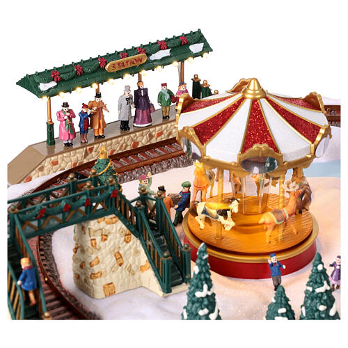 Christmas village set: train on snowy landscape, music motion and lights, 6x20x16 in 9