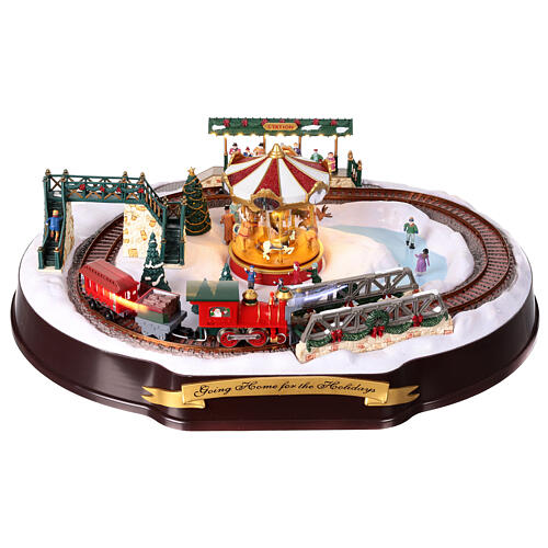 Christmas village set: train on snowy landscape, music motion and lights, 6x20x16 in 14