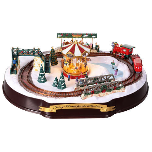 Christmas village set: train on snowy landscape, music motion and lights, 6x20x16 in 16