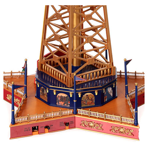 Giostra paracadute natalizia movimento musica luci h 50 cm 10