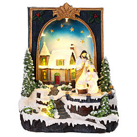 Christmas scene with Nativity, book with snowy village, music and lights, 10x8x6 in