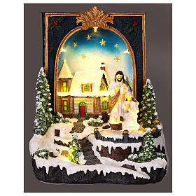 Christmas scene with Nativity, book with snowy village, music and lights, 10x8x6 in