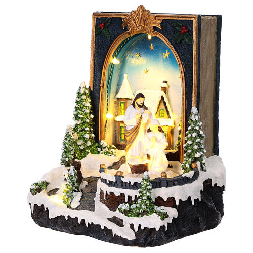 Christmas scene with Nativity, book with snowy village, music and lights, 10x8x6 in 3