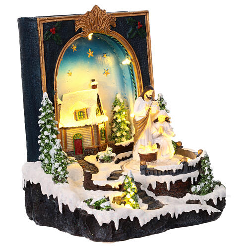 Christmas scene with Nativity, book with snowy village, music and lights, 10x8x6 in 4