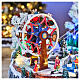 Pueblo navideño LED con teleférico, patinadores y noria 65x45x31 cm s7