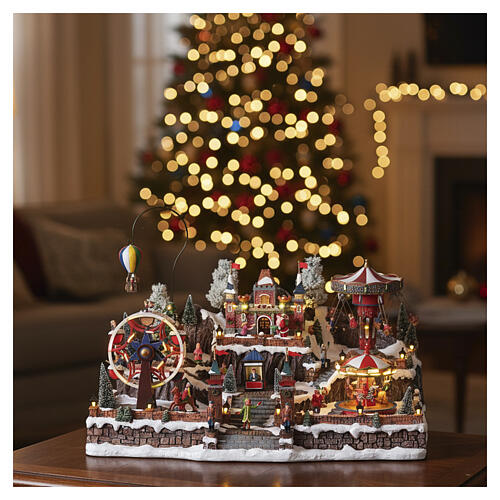 Winterszene „Jahrmarkt“ mit LED, Riesenrad, Karussells und Heißluftballon – 65 × 45 × 35 cm, Strombetrieb 2