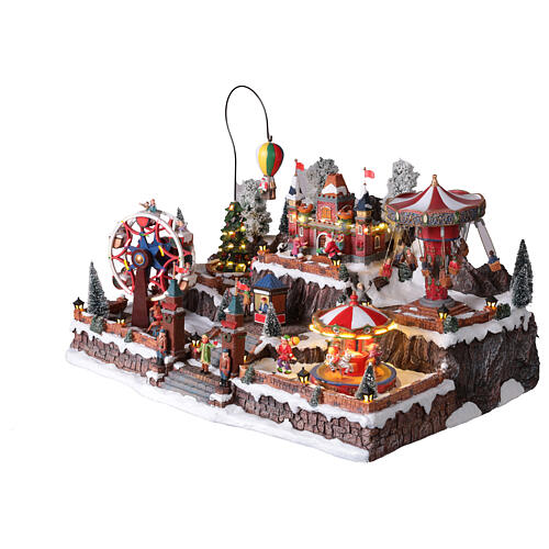 Winterszene „Jahrmarkt“ mit LED, Riesenrad, Karussells und Heißluftballon – 65 × 45 × 35 cm, Strombetrieb 8
