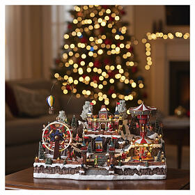 Christmas village: amusement park with hot air balloon, lights and music, 25x18x14 in, transformer