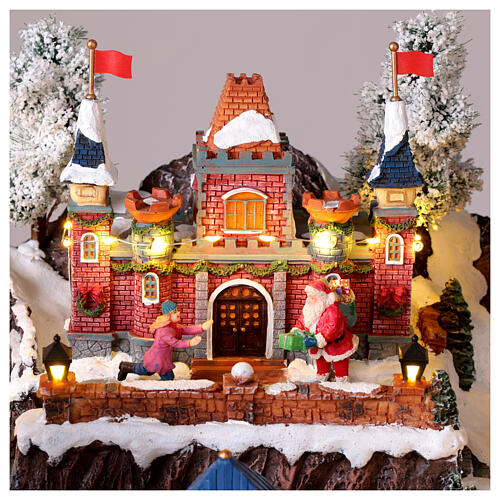 Pueblo navideño Parque Atracciones globo aerostático iluminado música 65x45x35 cm transformador 6