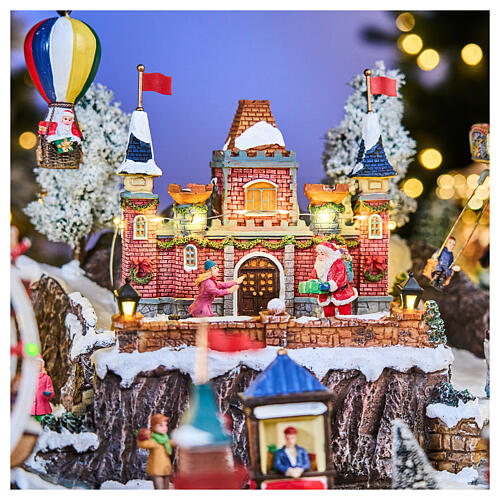 Pueblo navideño Parque Atracciones globo aerostático iluminado música 65x45x35 cm transformador 3