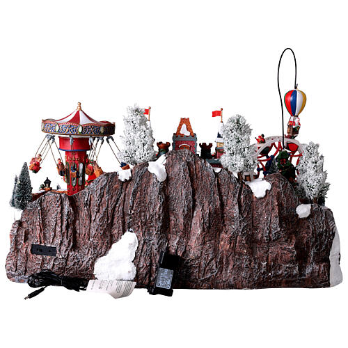Village de Noël fête foraine avec montgolfière illuminé musique 65x45x35 cm avec transformateur 12