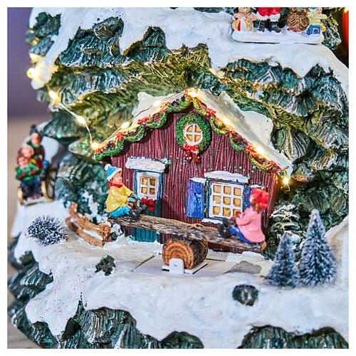 Village de Noël montagne LED mouvement manège musique 35x35x50 cm transformateur 8