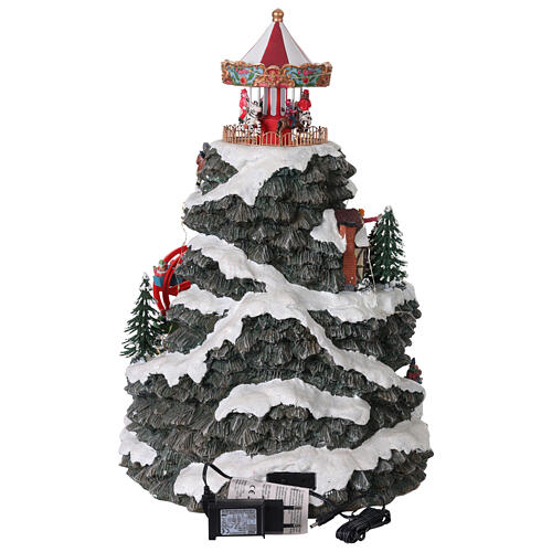 Village de Noël montagne LED mouvement manège musique 35x35x50 cm transformateur 11