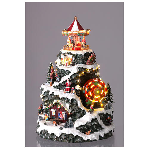 LED mountain Christmas village carousel music motion transformer, 35x35x50 cm 4