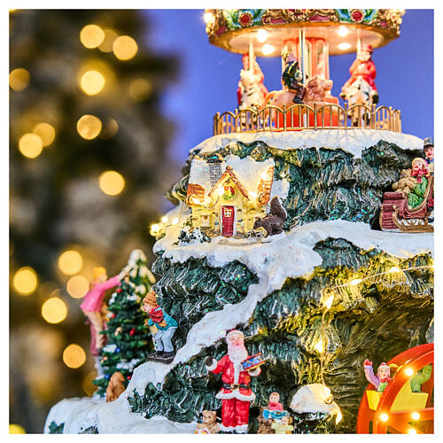 LED mountain Christmas village carousel music motion transformer, 35x35x50 cm 10
