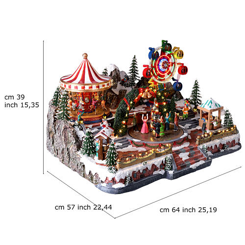 Deluxe Christmas Village: carnival in motion with colourful LED lights, 25x22x15 in, power supply 3