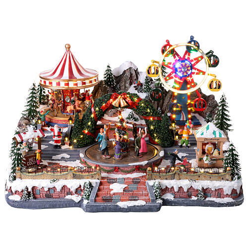 Village de Noël Deluxe Fête foraine en mouvement LEDs colorées 65x60x40 cm 1