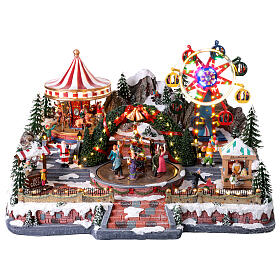 Villaggio Natalizio Deluxe Luna Park in movimento LED colorati 65x60x40 cm corrente