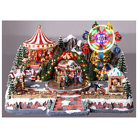 Villaggio Natalizio Deluxe Luna Park in movimento LED colorati 65x60x40 cm corrente