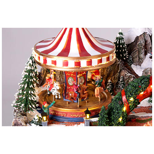 Villaggio Natalizio Deluxe Luna Park in movimento LED colorati 65x60x40 cm corrente 4