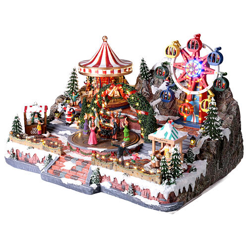 Villaggio Natalizio Deluxe Luna Park in movimento LED colorati 65x60x40 cm corrente 5