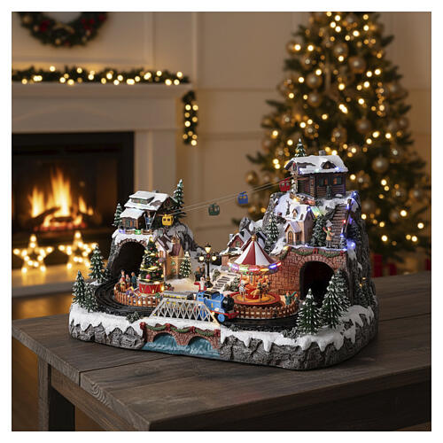 Deluxe Christmas Village with train, cable car, and carousel, 27x22x16 in 2