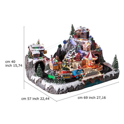 Deluxe Christmas Village with train, cable car, and carousel, 27x22x16 in 3