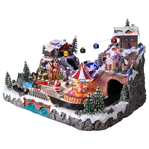 Deluxe Christmas Village with train, cable car, and carousel, 27x22x16 in 6