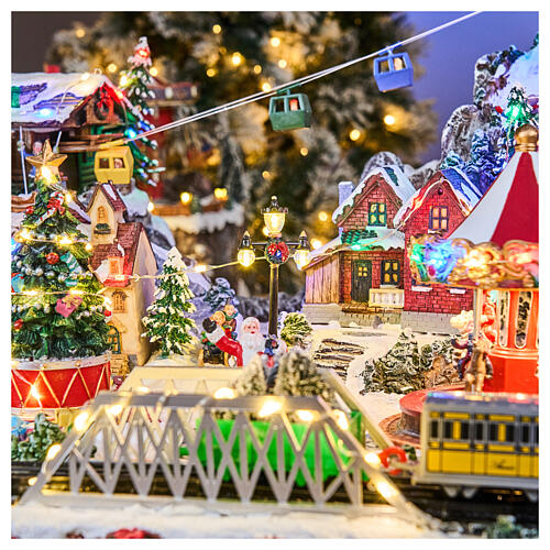 Pueblo navideño Deluxe música movimiento tren teleférico LED coloridos corriente 70x60x40 cm 8