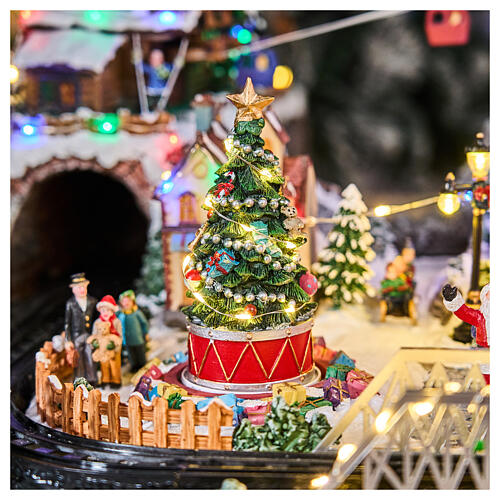 Pueblo navideño Deluxe música movimiento tren teleférico LED coloridos corriente 70x60x40 cm 11
