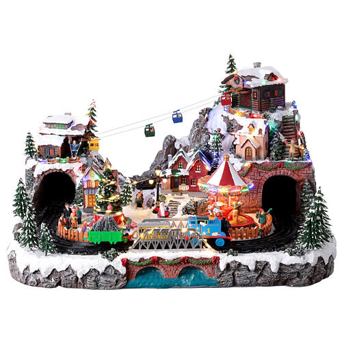 Villaggio Natale Deluxe musica movimento treno funivia LED colorati corrente 70x60x40 cm 1