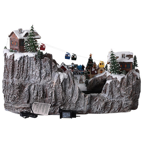 Villaggio Natale Deluxe musica movimento treno funivia LED colorati corrente 70x60x40 cm 10