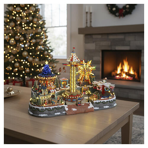 Winterszene „Jahrmarkt“ – Deluxe-Ausführung mit LEDs, Turmkarussell, Pferdekarussell und Riesenrad, 95 × 65 × 60 cm, Strombetrieb 2