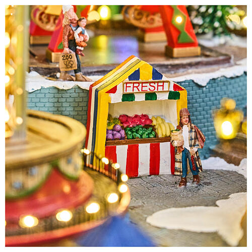 Winterszene „Jahrmarkt“ – Deluxe-Ausführung mit LEDs, Turmkarussell, Pferdekarussell und Riesenrad, 95 × 65 × 60 cm, Strombetrieb 11