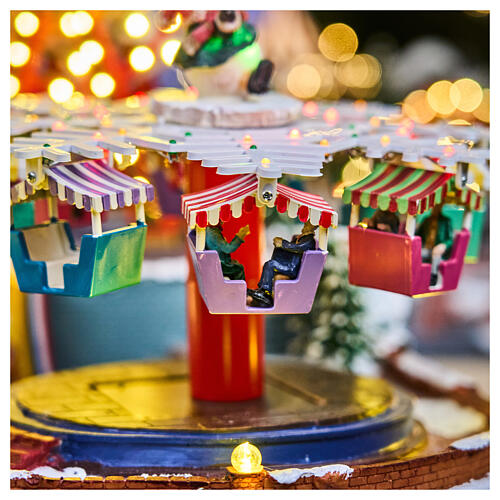 Winterszene „Jahrmarkt“ – Deluxe-Ausführung mit LEDs, Turmkarussell, Pferdekarussell und Riesenrad, 95 × 65 × 60 cm, Strombetrieb 13