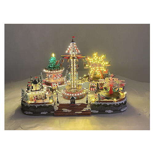 Villaggio Natalizio deluxe Luna Park movimento LED colorati 95x65x60 cm corrente 2