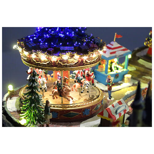 Villaggio Natalizio deluxe Luna Park movimento LED colorati 95x65x60 cm corrente 5