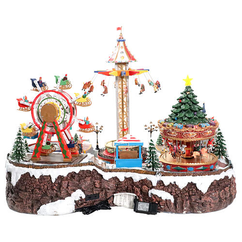 Villaggio Natalizio deluxe Luna Park movimento LED colorati 95x65x60 cm corrente 13