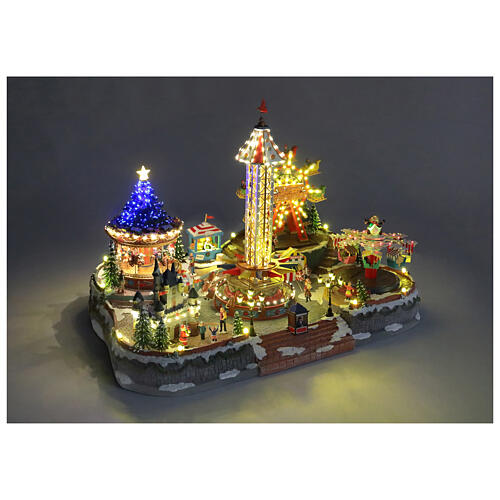 Villaggio Natalizio deluxe Luna Park movimento LED colorati 95x65x60 cm corrente 5