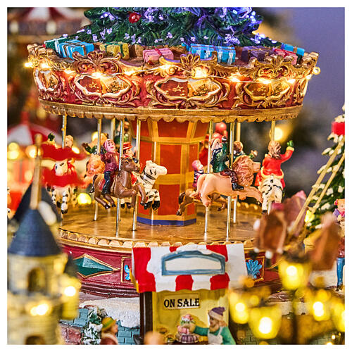 Miasteczko bożonarodzeniowe Deluxe Luna Park z ruchem i kolorowym oświetleniem LED, 95x65x60 cm, zasilanie sieciowe 7