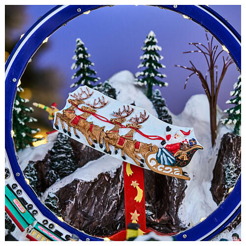 Winterszene – Deluxe-Ausführung mit LEDs, Schlittschuhläufern, Zug, Schlitten und Karussell, 65 × 55 × 45 cm, Strombetrieb 10