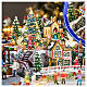 Village de Noël Deluxe patineurs manège musique LEDs mouvement 65x55x45 cm électrique s12