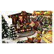 Villaggio Natalizio deluxe pattinatori giostre movimento LED musica 65x55x45 cm corrente s11