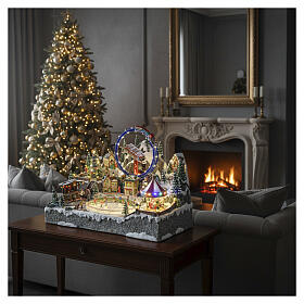 Deluxe Christmas Village with Skaters, Train, Sleigh, and Merry-Go-Round Electric,65x55x45 cm