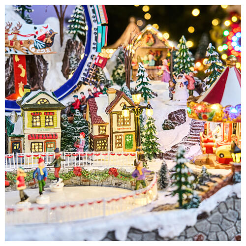 Deluxe Christmas Village with Skaters, Train, Sleigh, and Merry-Go-Round Electric,65x55x45 cm 9