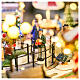 Pueblo navideño ciudad patinadores carrusel movimiento LED coloridos 60x50x25 cm eléctrico s12