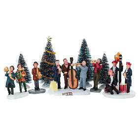 Set musicisti e alberi assortiti per villaggio natalizio 8 cm