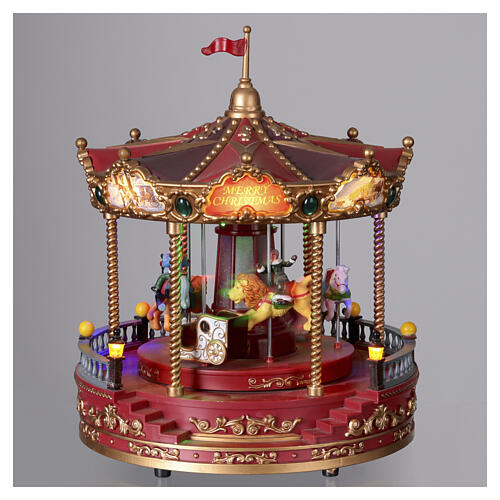 Christmas carousel with music and lights and motion, 10x10 in 5