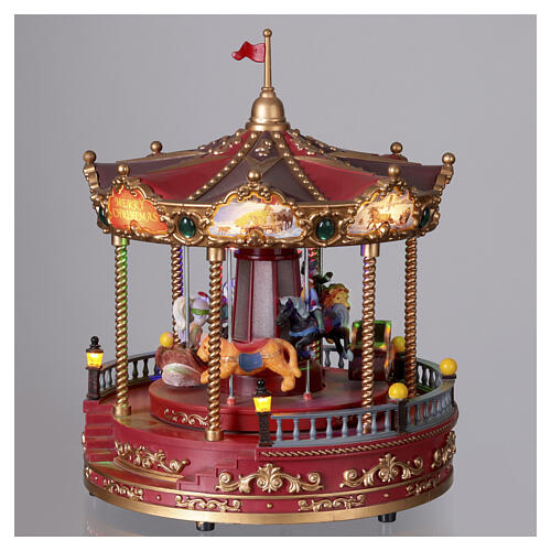 Red Christmas carousel with music, lights, and movement 23x25 cm 3